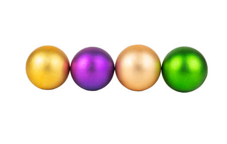 Four colored Christmas balls isolated on white backgroundの写真素材
