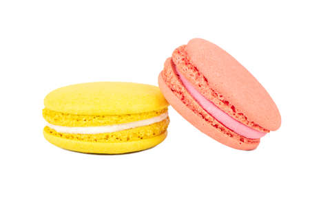 Lemon and raspberry macaroons isolated on white backgroundの写真素材