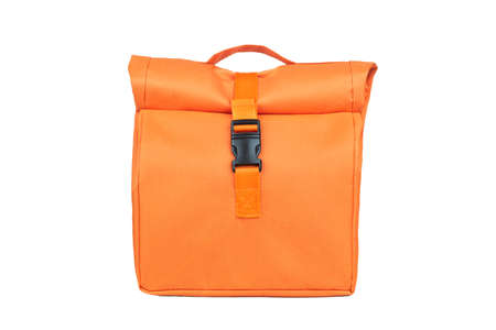 Orange fabric lunch bag isolated on white backgroundの写真素材