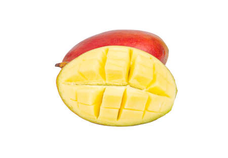 Mango with juicy half isolated on white backgroundの写真素材
