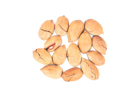 Bunch of organic pecans in shell on white background, top viewの写真素材