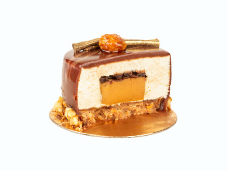 Half of chocolate brownie with sweet mascarpone cheese, salted caramel and cookies isolated on white background.の写真素材