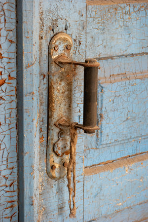 Old, rusty and dirty doorknob close-up.の写真素材