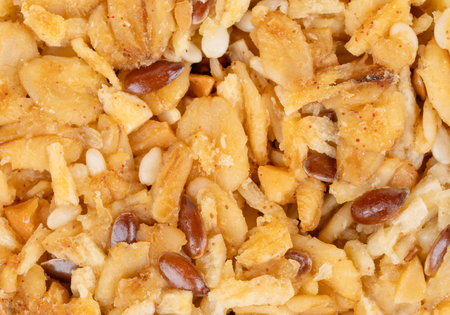 Granola cookies with healthy cereals and grains in honey close-up under the backgroundの写真素材