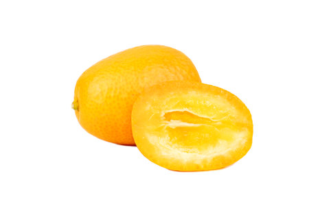 Fresh kumquat fruit with juicy half isolated on white backgroundの写真素材