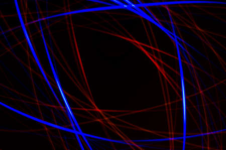 Light spiral, red and blue lines on a black backgroundの写真素材