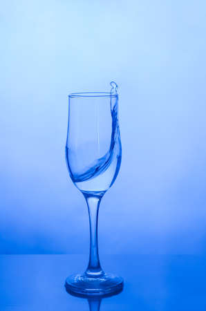 Water splash in a glass.の写真素材