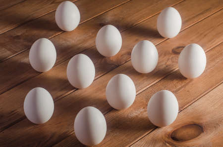 Eggs on the wooden table.の写真素材