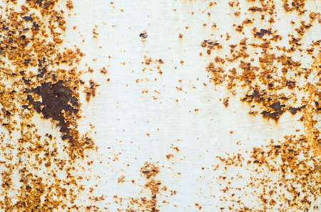 Old paint on rusty metal texture.の写真素材