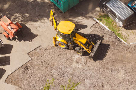 Road repair tractor removes old asphalt.の写真素材