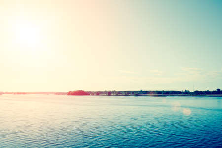 Morning sun over the river, tonedの写真素材