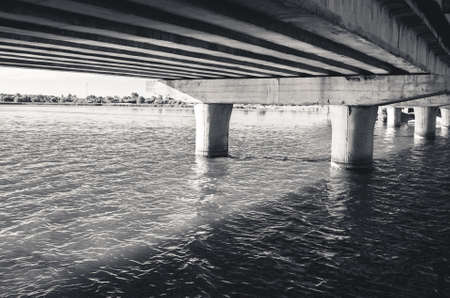 Old concrete bridge over the river.の写真素材