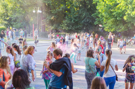2 september 2017 Ukraine, White Church.Young people have fun during the Holi holiday throwing...