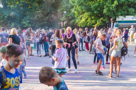 2 september 2017 Ukraine, White Church.Young people have fun during the Holi holiday throwing colorful powder into each other.のeditorial素材