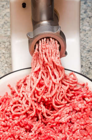 Mincer makes raw meat minced.の写真素材
