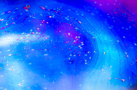 Beautiful psychedelic abstraction formed by light on the surface of a soap bubble.の写真素材