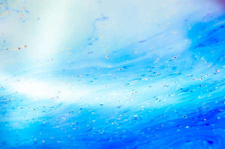 Beautiful psychedelic abstraction formed by light on the surface of a soap bubble.の写真素材