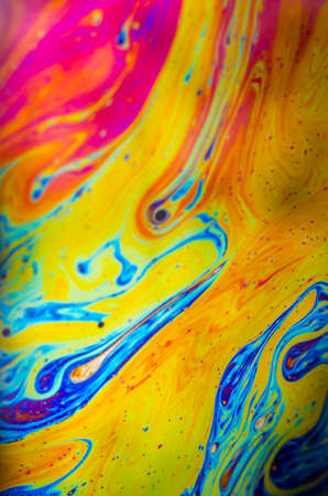 Beautiful psychedelic abstraction formed by light on the surface of a soap bubble.の写真素材