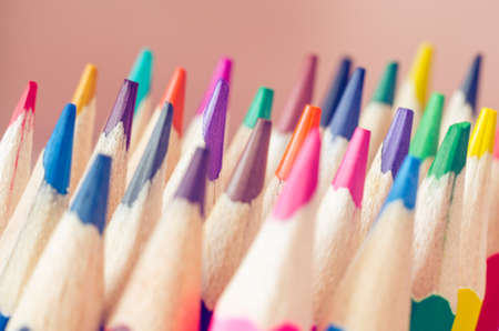 Colored pencils for drawing background.