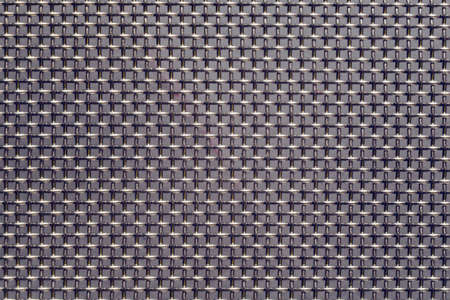 Metal mesh background texture close-up.