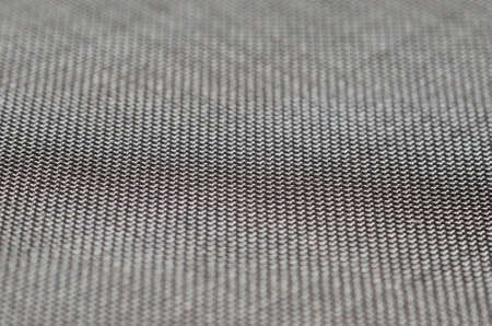 Metal mesh background texture close-up.