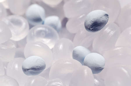 Polypropylene granule with a polymer additive close-up, background texture.の写真素材
