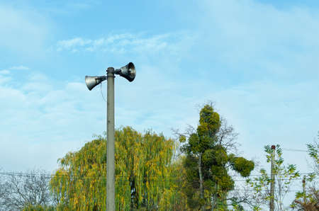 Old outdoor street loudspeaker for public announcements.の写真素材