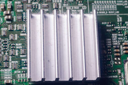 A thick layer of dust covers the internal electronic components of the computer.