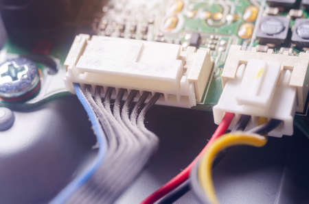 A thick layer of dust covers the internal electronic components of the computer.