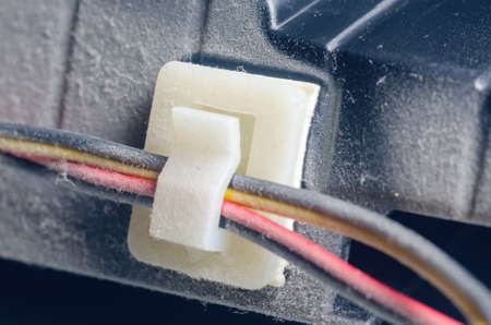 A thick layer of dust covers the internal electronic components of the computer.