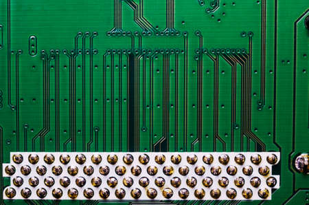Electronic circuit board close up background texture.