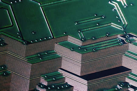 Electronic circuit board close up background texture.