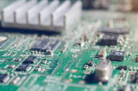 A thick layer of dust covers the internal electronic components of the computer.
