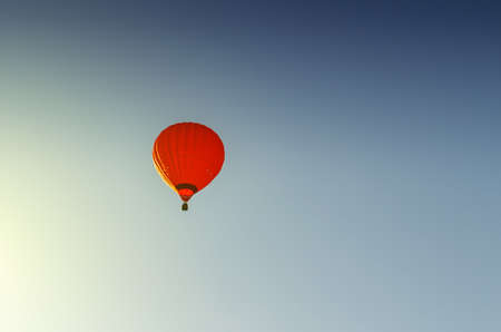 Colorful hot air balloon against the blue sky.の写真素材