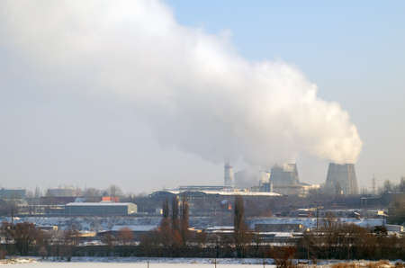 Thermal power plant with chimneys, industrial landscape.の写真素材