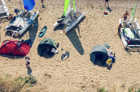 Sanzhejka, Ukraine, August 05, 2018 preparation of sailing catamarans to go to sea on a sandy beachのeditorial素材