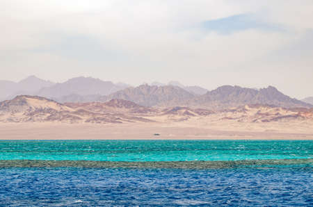 Mountain landscape with blue water in the national park Ras Mohammed, Egypt