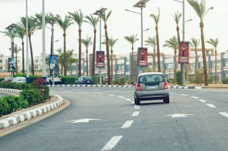 Sharm El Sheikh, Egypt, May 07, 2019: surroundings of the resort town, cars driving along the roadのeditorial素材
