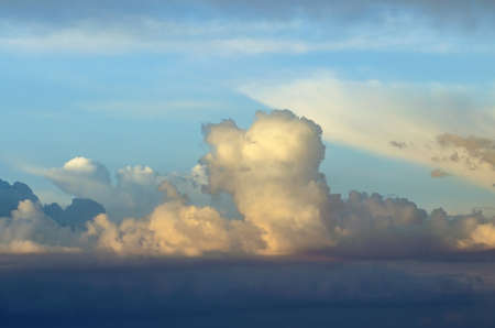 Beautiful stormy cumulus clouds in the sky, backgroundの写真素材