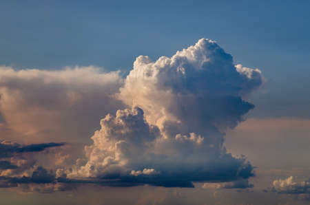 Beautiful stormy cumulus clouds in the sky, backgroundの写真素材
