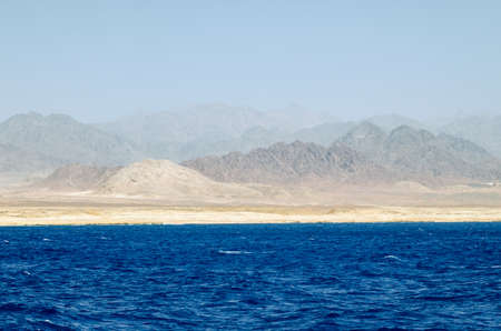 Mountain landscape with blue water in the national park Ras Mohammed, Egyptの写真素材