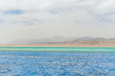 Mountain landscape with blue water in the national park Ras Mohammed, Egyptの写真素材