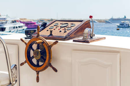 Steering wheel on the deck of the ship. Captain's Workplace.の写真素材