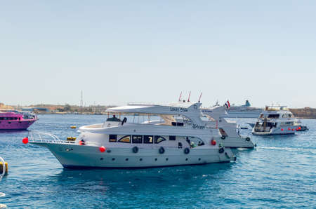 Sharm El Sheikh, Egypt May 08, 2019: Tourist pleasure boats in the harbor of Sharm El Sheikh
