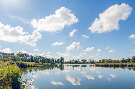 Beautiful summer landscape with a river and blue sky