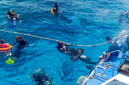 Sharm El Sheikh, Egypt May 08, 2019:Pleasure cruise ship stands near the coral reef, people swim in the seaのeditorial素材