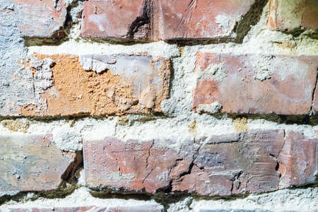 Old wall of red brick, background texture.