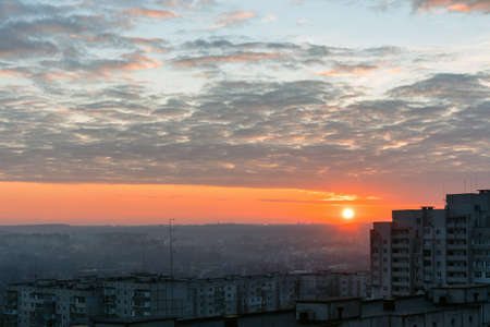 Beautiful red sunset over the city, cityscape.の写真素材