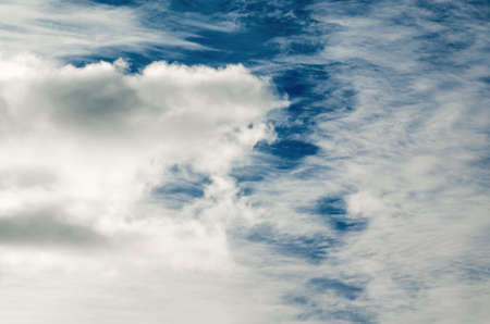 Beautiful clouds on a background of blue sky.