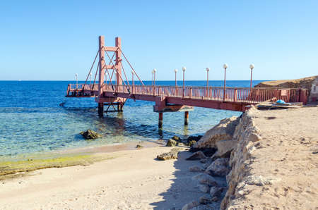 Empty pier with sea view on a sunny day.の写真素材